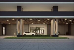 Elegant lower ground drop-off lobby at Brixton Tower, Causewayz Square @ JBCC by EXSIM CIQ, featuring modern lighting, sheltered driveway, and landscaped greenery for a premium arrival experience
