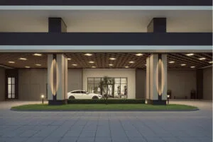 Elegant lower ground drop-off lobby at Brixton Tower, Causewayz Square @ JBCC by EXSIM CIQ, featuring modern lighting, sheltered driveway, and landscaped greenery for a premium arrival experience