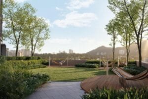 Outdoor stargazing deck at The Lighthauz with hammock seating, landscaped garden and sunset view.