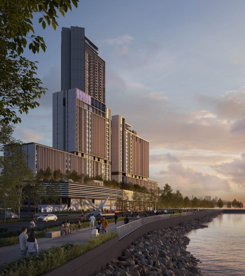 Evening perspective of Keeperz Suites tower with podium facilities and waterfront walkway in Gelugor, Penang.